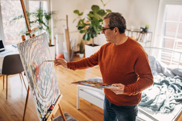 istock The artist works in a home studio 1360946116