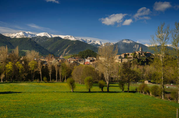 Serra del Cadí range seen from Bellver de Cerdanya in spring (Cerdanya, Catalonia, Spain, Pyrenees) stock photo