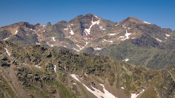 Pica d'Estats massif seen from the Tristaina summit  (Pyrenees, Andorra) stock photo