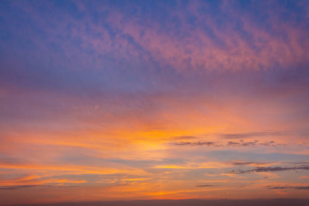 istock Colorful sunset with clouds in the evening 1360978400