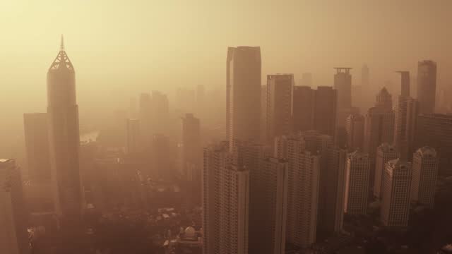 Bad air pollution with orange sky in the city