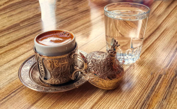 istock Turkish coffee with traditional embossed metal tray and cup 1361007986