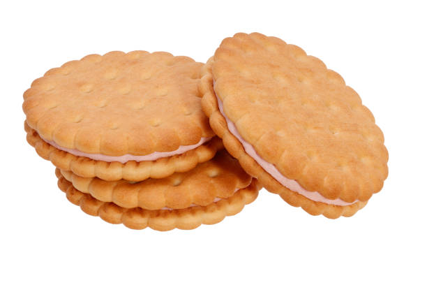 istock three crispy cookies with pink filling in the middle isolated on white background 1361012750