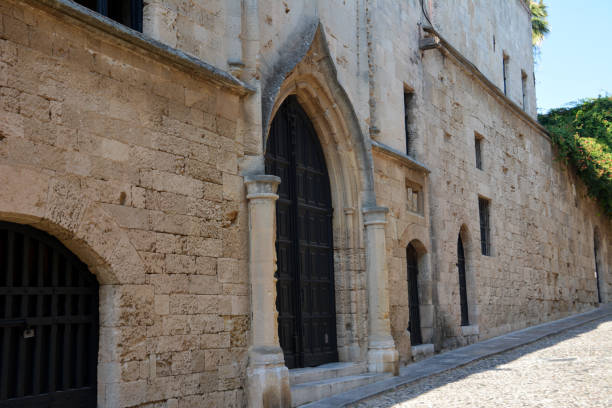 istock medieval street with buildings with arch doors and windows 1361012859