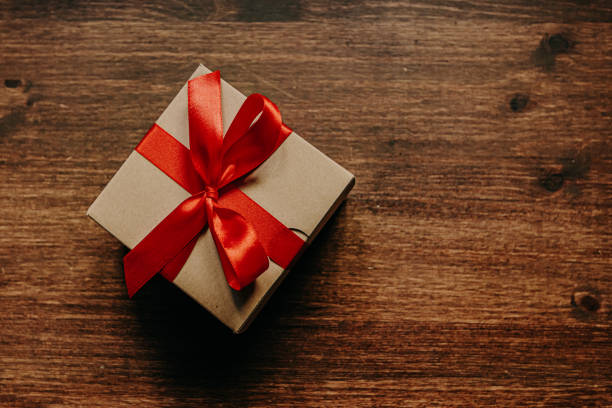 istock gift the cardboard box is decorated with a red gift ribbon 1361013272