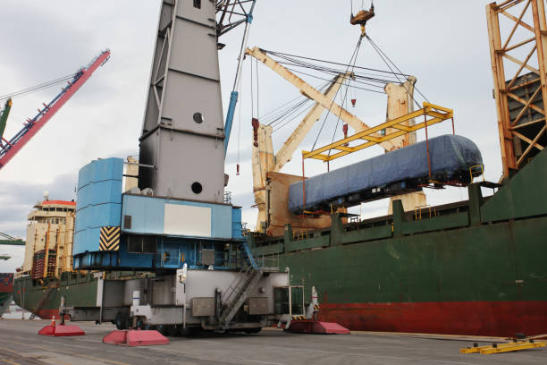 istock Train car being disembarked at the port 1361020482