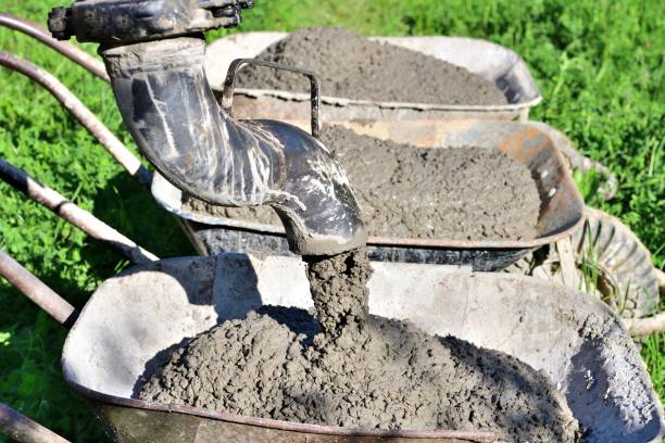 istock Concrete trucks filled from the pump machine 1361034042