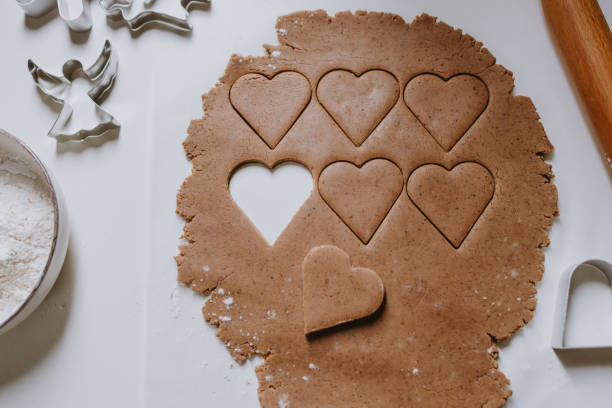 istock Preparing Christmas Gingerbread Cookies at Home 1361051771
