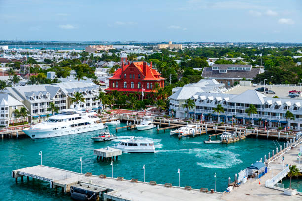 Aerial view of the cruise ship pier, the adjacent marina and commercial center with the city of Key West, Florida in the background stock photo