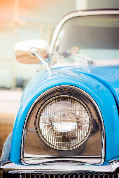 istock Head light of a classic car 1361055451