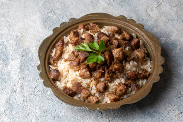 istock Turkish Meat Et Kavurma with rice - pilav (Turkish name; kurban kavurma, pilav ustu kavurma) 1361074615