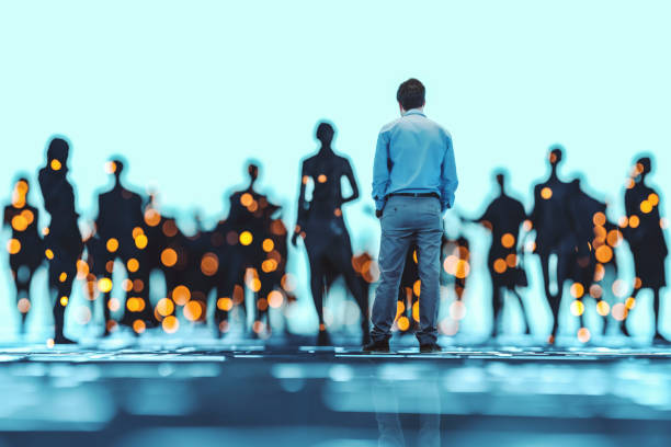 istock Abstract businessman standing in VR environment 1361076651