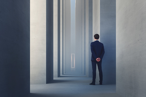 Abstract businessman watching behind concrete pillar, 3D generated image.