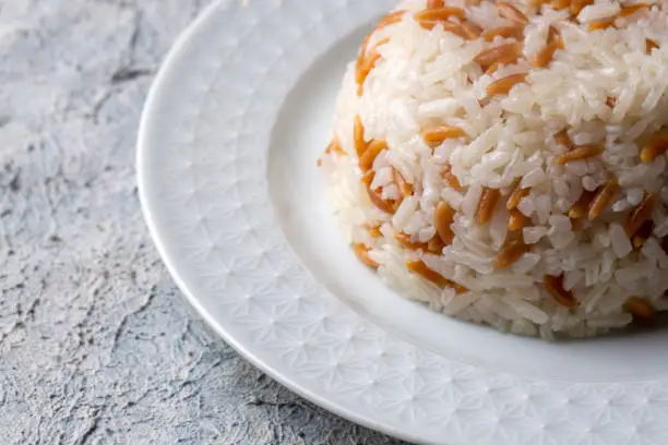 Traditional delicious Turkish food; Turkish style rice pilaf (Turkish name; Arpa sehriyeli pirinc pilavi)