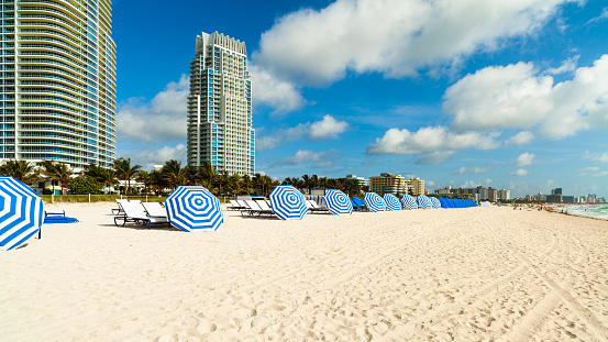 Beautiful Miami Beach cityscape with colorful umbrellas and luxury condos.