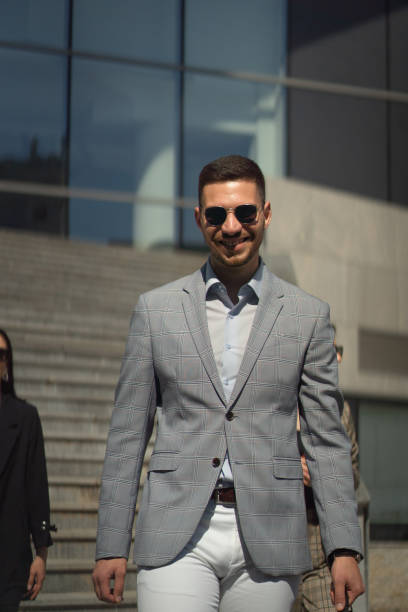 istock Urban businessman is walking 1361082777