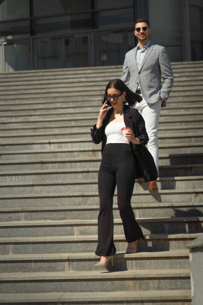 istock Female boss is talking on the phone with her partner 1361082789