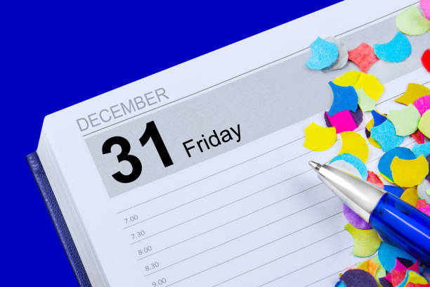 istock Calendar 2021 December 31 Friday with pen and confetti on blue background 1361084479
