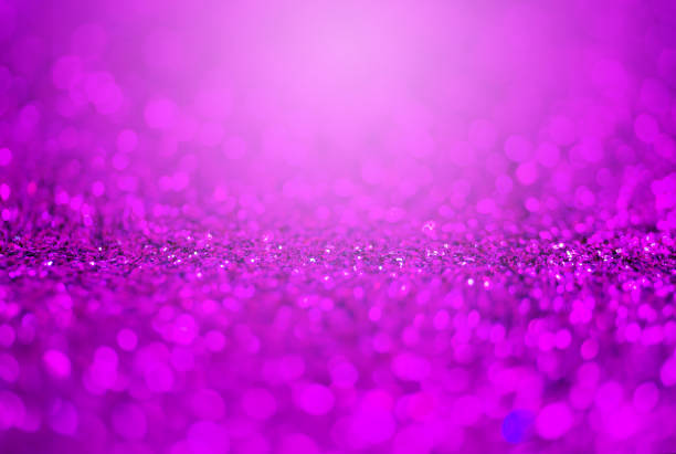 istock Glitter light abstract purple bokeh light trends color 1361085739