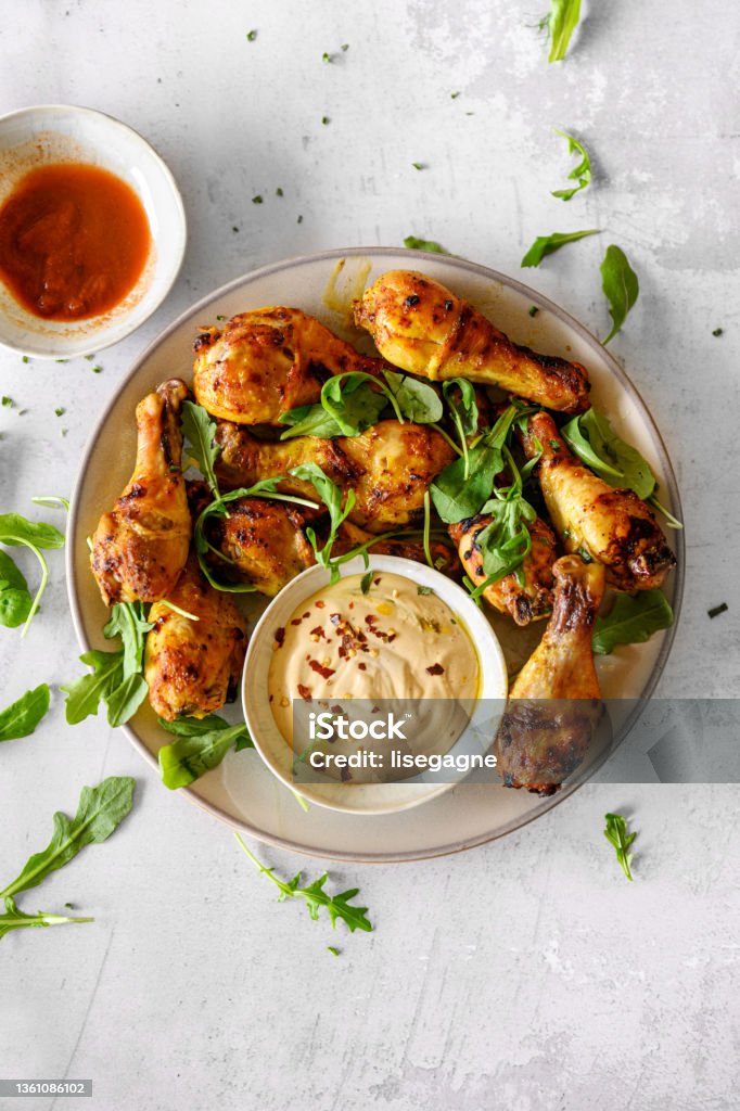 Harissa drumsticks Diverse Keto Dishes, Quebec, Canada Plate Stock Photo Harissa drumsticks Diverse Keto Dishes, Quebec, Canada Plate Stock Photo