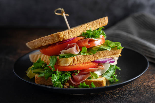 istock Tasty sandwich with vegetables and meat 1361086877