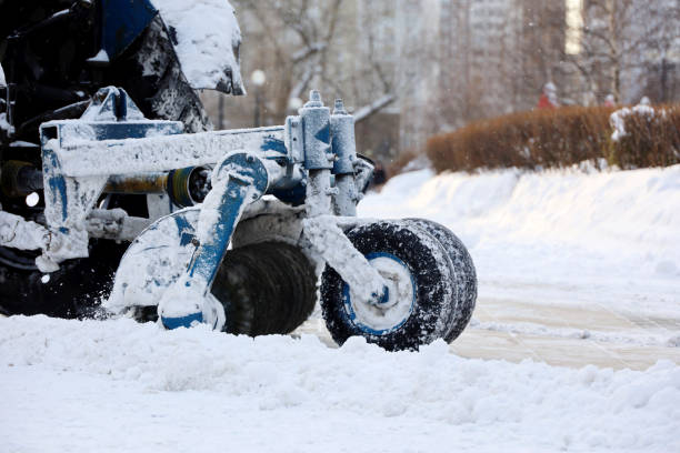 istock Snow plow machine removing the snow on the street 1361087000