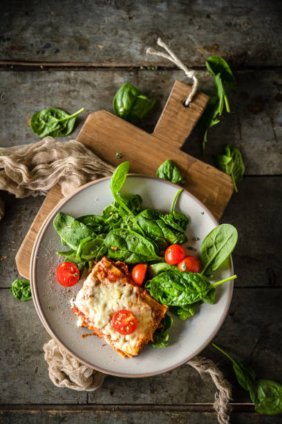 lasagna and spinach stock photo