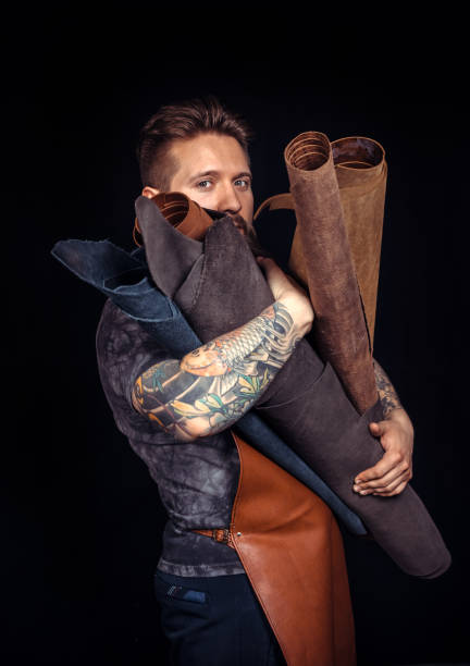 istock Skinner wording with leather goods in leather shop 1361089305