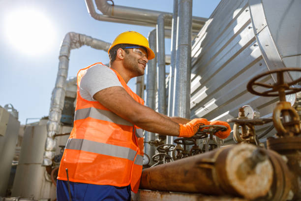 istock Skillful multiethnic engineer working at heavy industry plant 1361092362