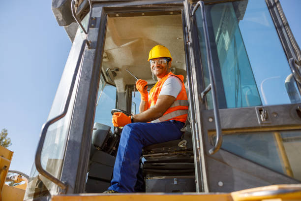 istock Manual worker driving cargo truck in plant 1361092466