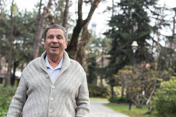 istock Portrait of senior man smiling 1361093881