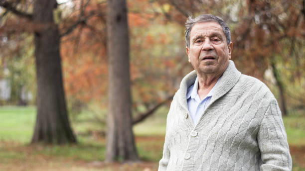 elderly man alone - portrait men senior adult depression imagens e fotografias de stock