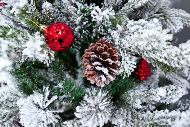 istock Christmas tree decoration with toys and cone close up 1361095792