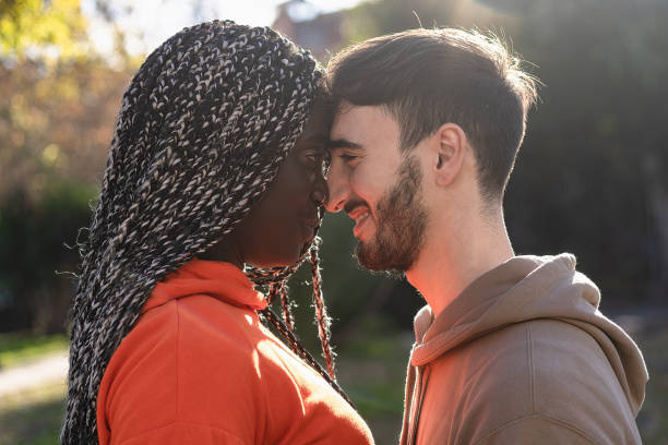 istock A romantic multiracial couple close forehead to forehead 1361106600