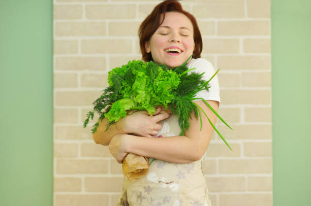 istock Woman with Green and vegetables. 1361109029