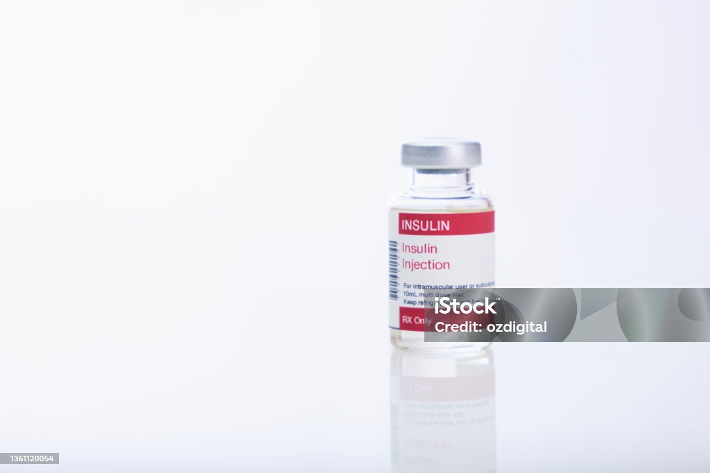 Insulin vial Insulin vial on white Insulin Stock Photo