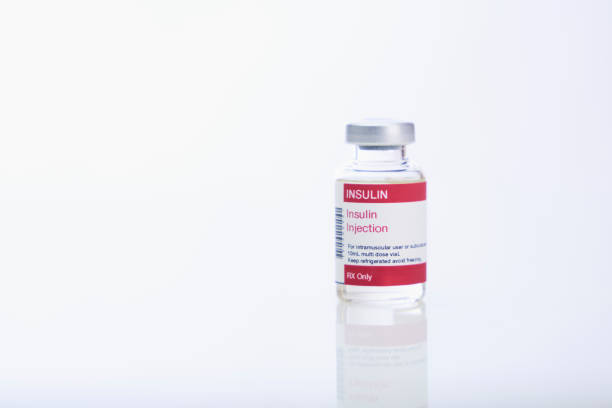 Insulin vial Insulin vial on white insulin stock pictures, royalty-free photos & images