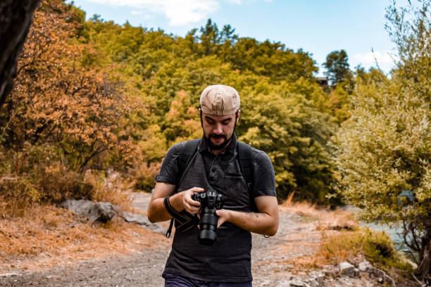 istock Nature photographer shooting Mother Nature 1361122214
