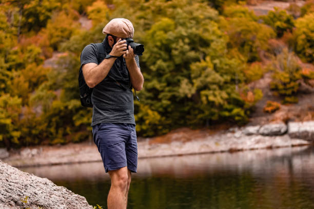istock Nature photographer shooting Mother Nature 1361122344