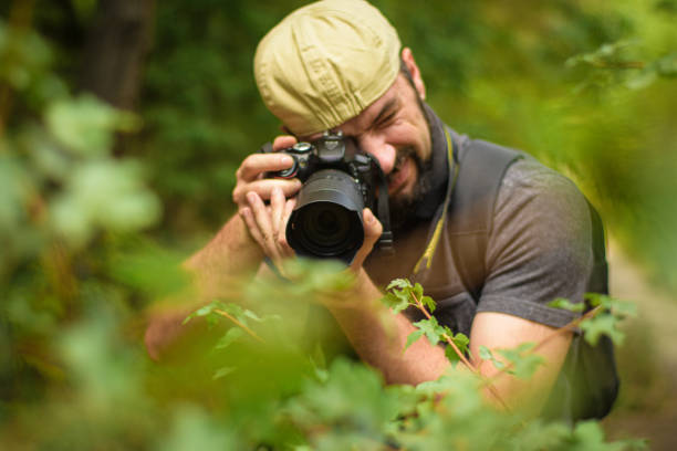 istock Nature photographer shooting Mother Nature 1361122420