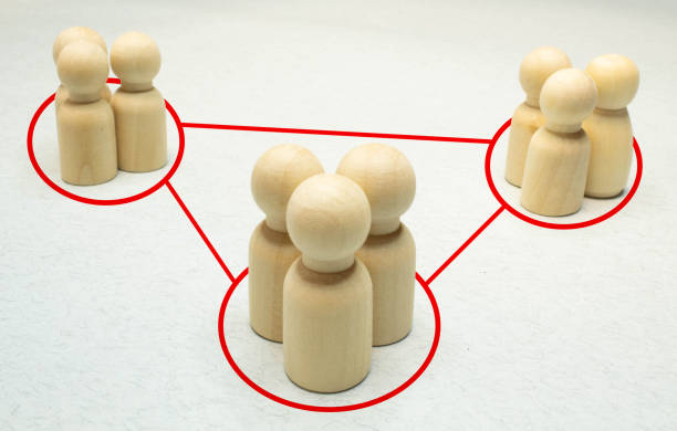 istock Communication between people. The figures are tied with a red thread. spreading rumors. 1361156238