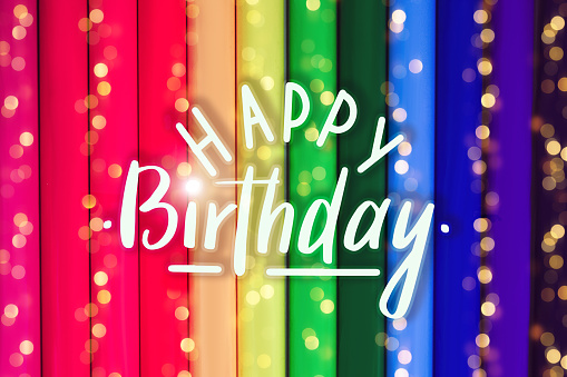 Happy  birthday card with rainbow background and bokeh lights