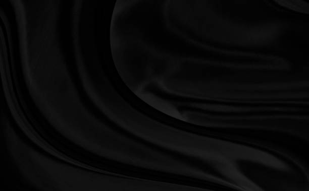istock Black gray satin dark fabric texture luxurious shiny that is abstract silk cloth background with patterns soft waves blur beautiful. 1361178221