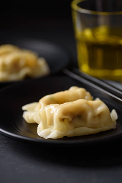 istock Wonton stuffed, gyoza or dumplings 1361187342