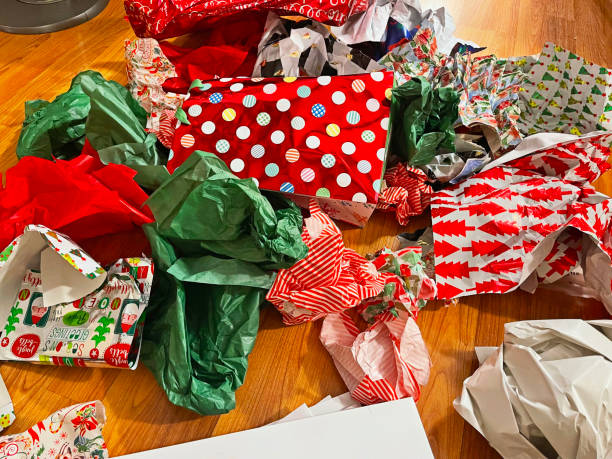 wrapping paper after opening presents - unwrapped imagens e fotografias de stock