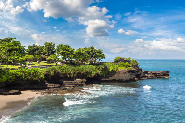 Rocky coast on Bali, Indonesia Rocky coast on Bali, Indonesia in a sunny day rocky coastline stock pictures, royalty-free photos & images