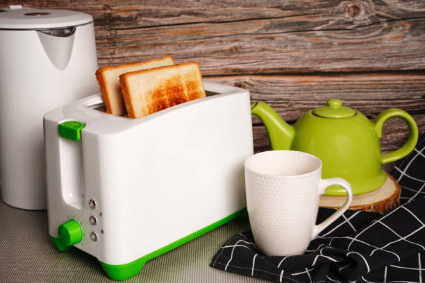 istock Toaster and two hot toasts ready to serve for the breakfast 1361205107
