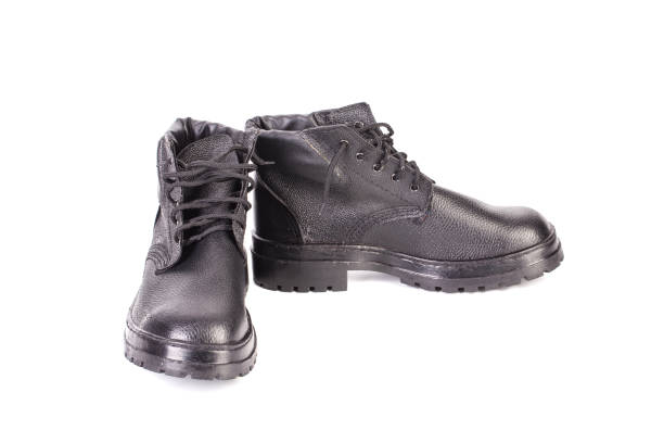 istock Close-up of a black leather boots with black lacec. 1361214204