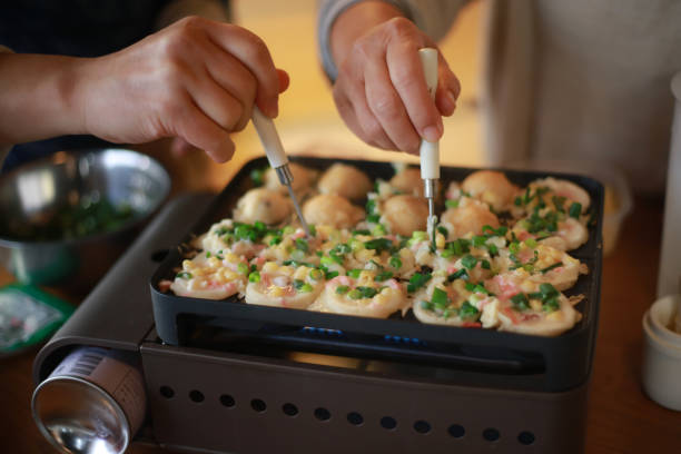 istock Female burning takoyaki 1361214405