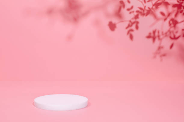 istock scene with circle podium on pink background and shadows 1361239677